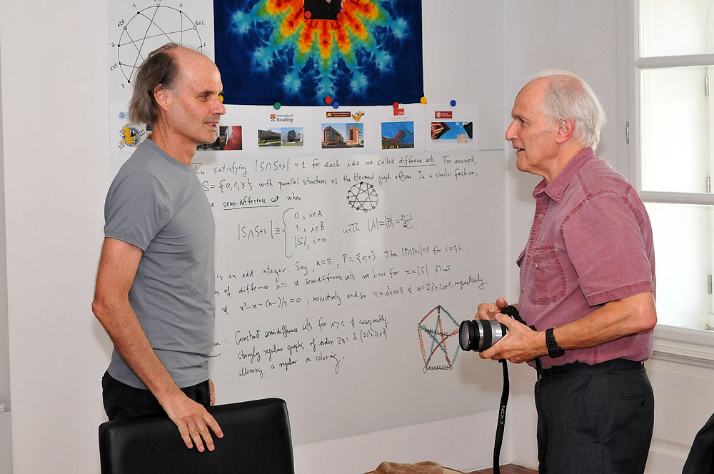 Rector of the University of Primorska, Prof. Dragan Marušič, PhD, talking to Prof. Sir Harold Kroto, PhD.